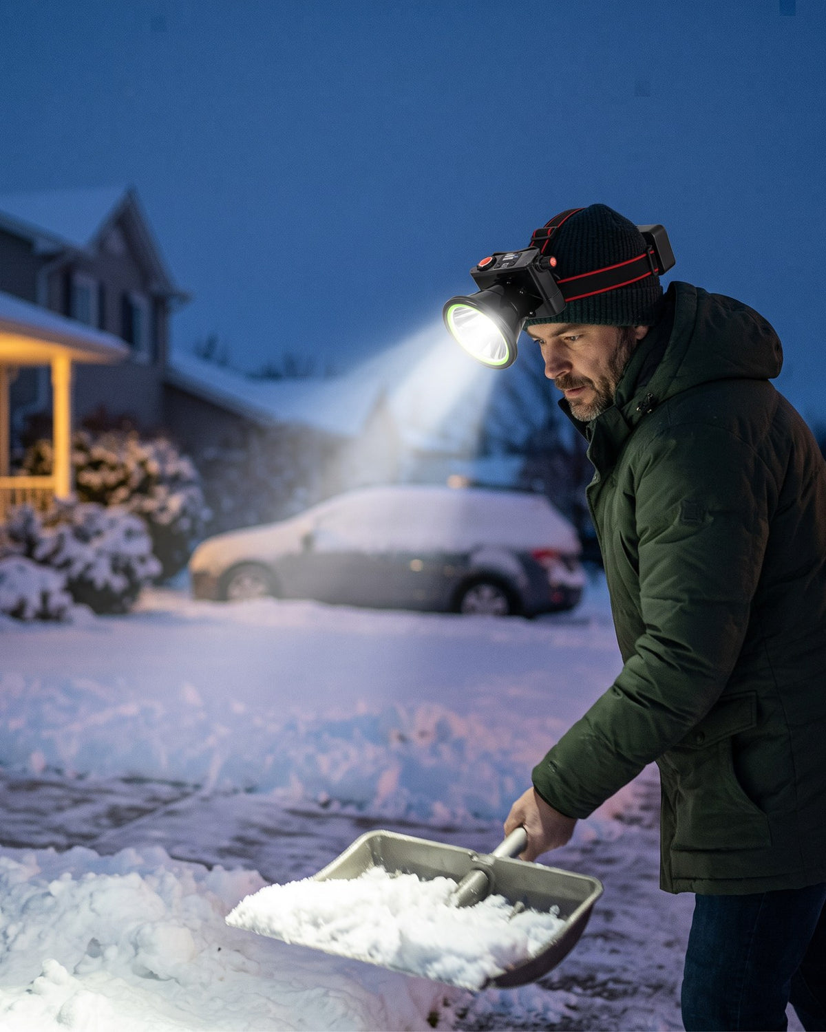 Wearing the headlamp while clearing snow