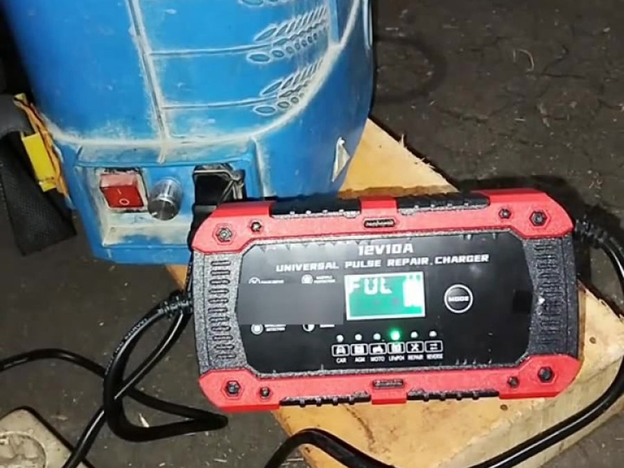 Charger maintaining a battery on a workbench