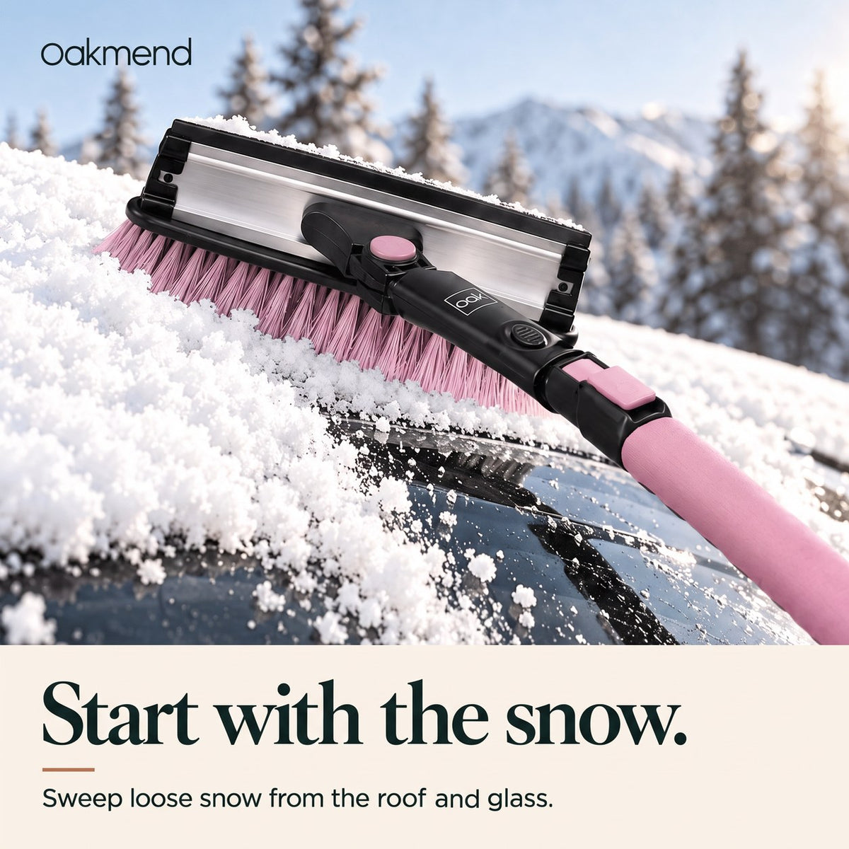 Pink bristle head sweeping loose snow from a car roof