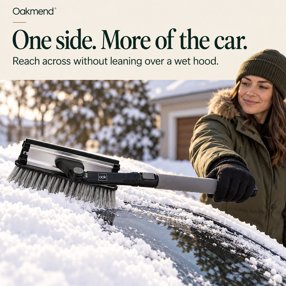 Woman reaching across a car roof with the extendable snow brush