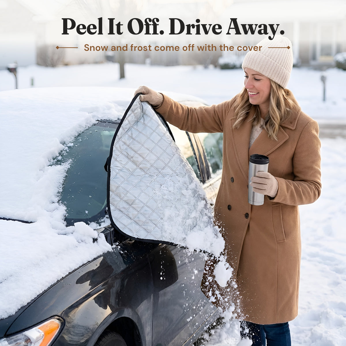 Woman peeling the snowy windshield cover off her car, snow and frost come off with it