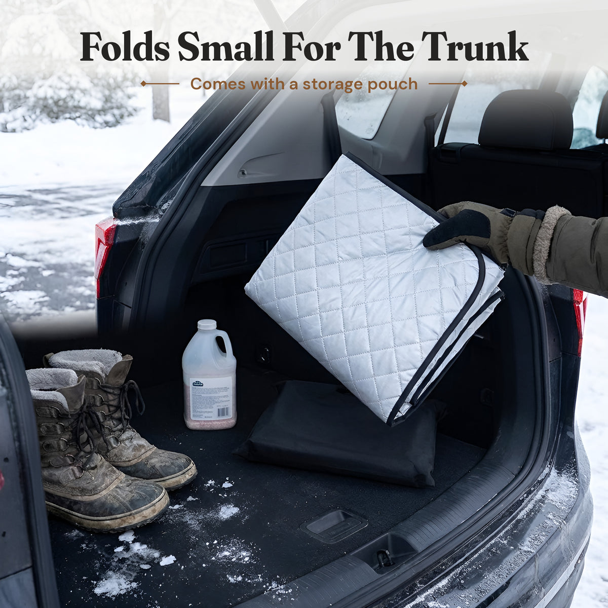 Folded windshield cover being stored in an SUV trunk
